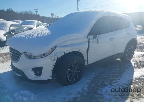 2016 Mazda Cx-5 Grand Touring z USA, uszkodzony, nr VIN JM3KE4DY5G0888487